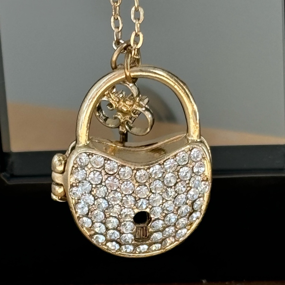 Claire’s rhinestone lock & key necklace/ gold tone/measures 32 in total …